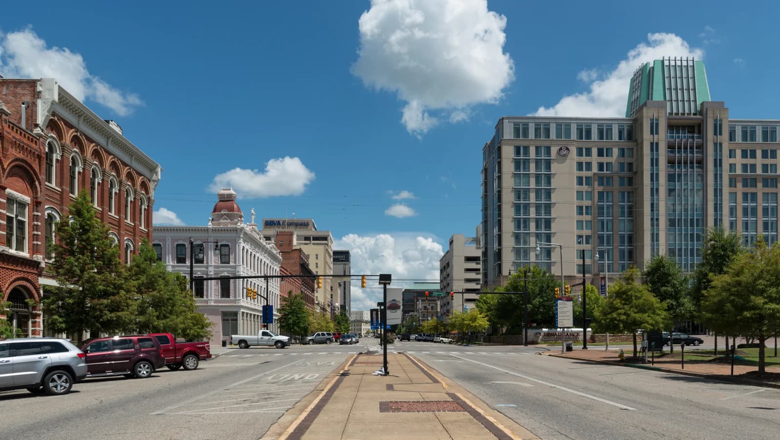 Commerce Street in downtown Montgomery, Alabama under a blue sky